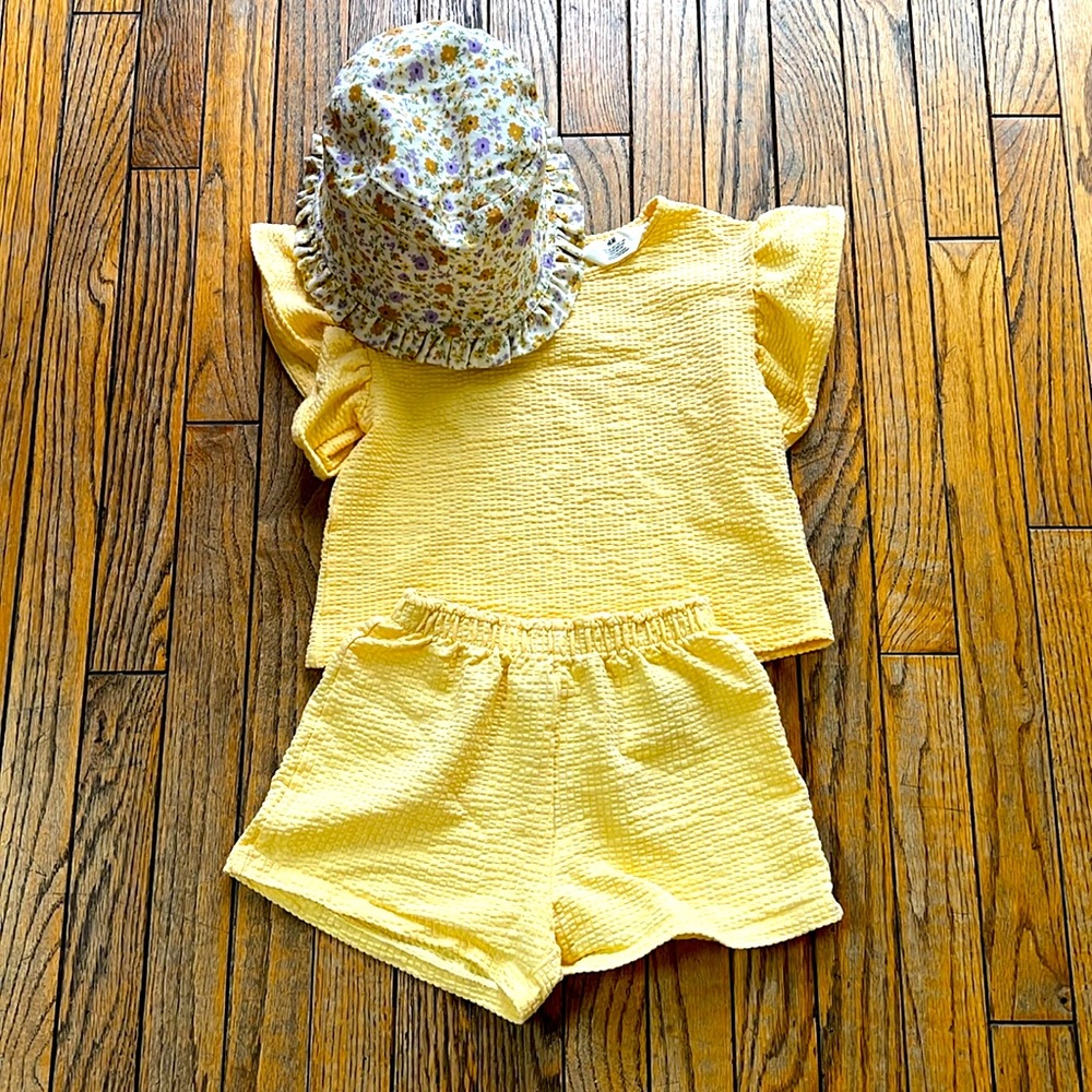 H&M outfit, size 7 (7-8), yellow shorts and top, bucket hat.